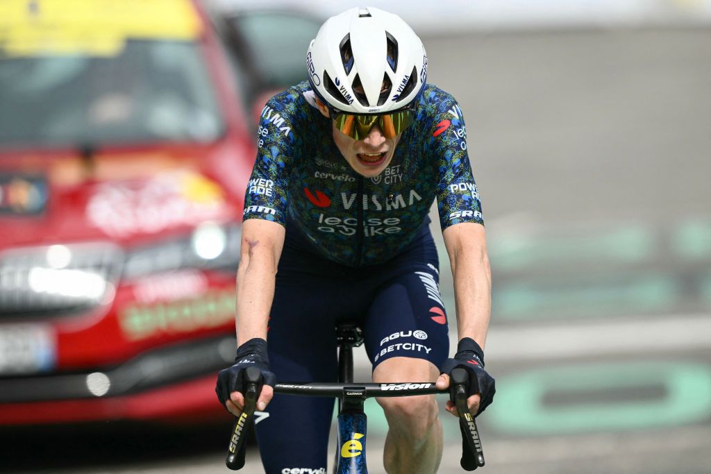 Team Visma - Lease a Bike team's Danish rider Jonas Vingegaard cycles past the finish line of the 14th stage of the 111th edition of the Tour de France cycling race, 151,9 km between Pau and Saint-Lary-Soulan Pla d'Adet, in the Pyrenees mountains in southwestern France, on July 13, 2024. (Photo by Marco BERTORELLO / AFP)