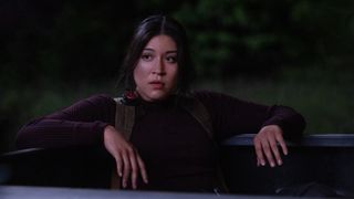 A seated Maya Lopez looks surprised in Marvel Studios' Echo