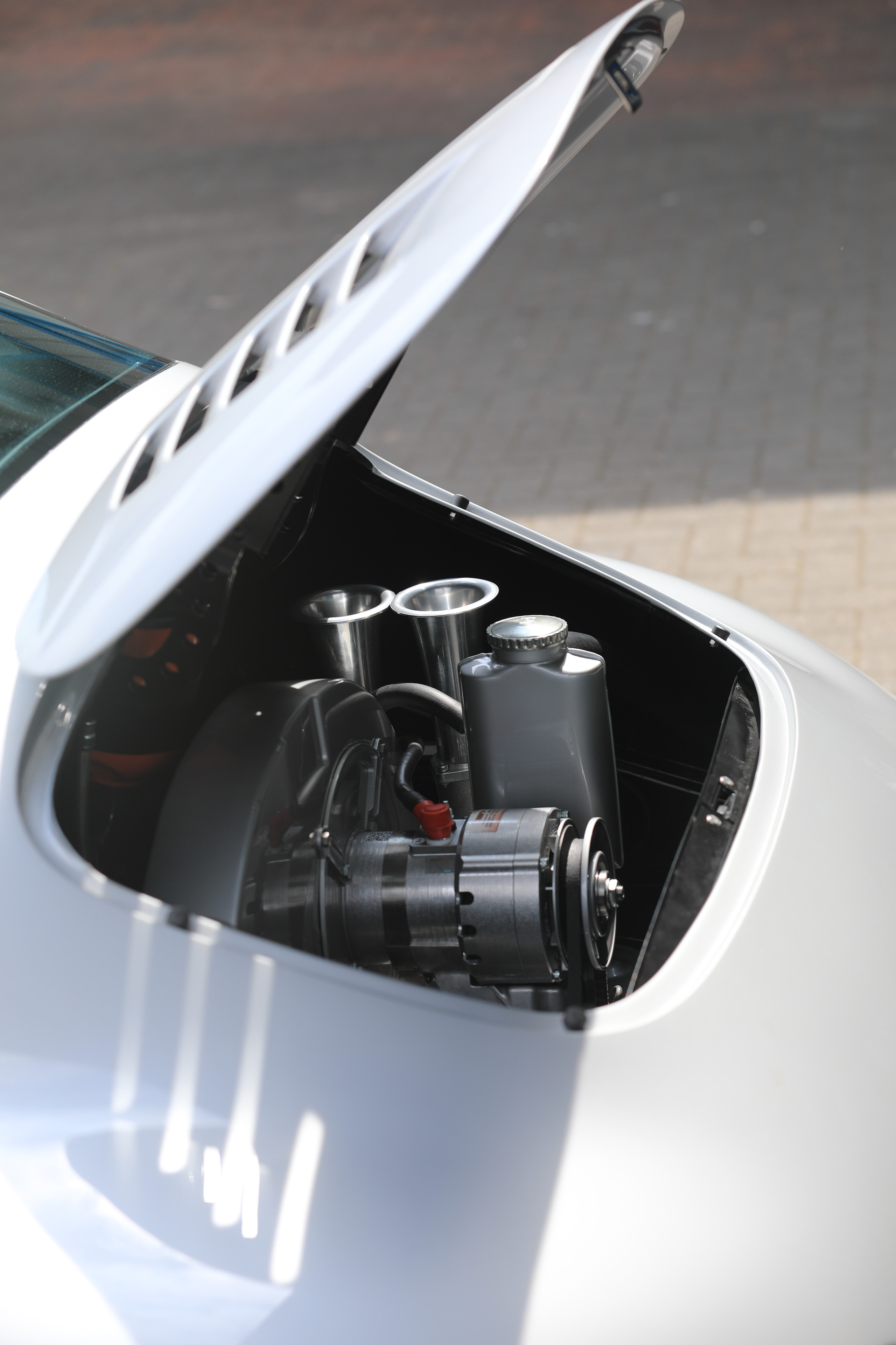 The car is powered by a bespoke 2,332 cc air-cooled flat-four engine