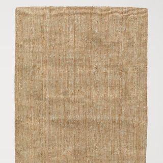 Thick Jute Rug against a white background.