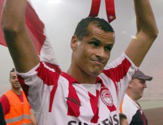 Rivaldo celebrates after winning the 2004/05 Greek Super League title with Olympiacos