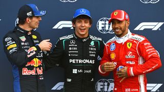 Mercedes' Kimi Antonelli flanked by Red Bull's Max Verstappen and Ferrari's Lewis Hamilton at the 2026 Monaco Grand Prix