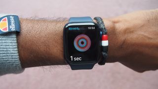 Apple Watch 6 on man's wrist showing Blood Oxygen app