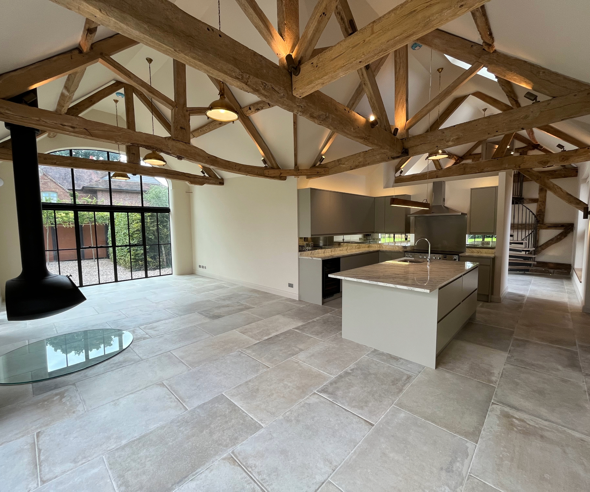 Barn conversion with spotlights in the beams
