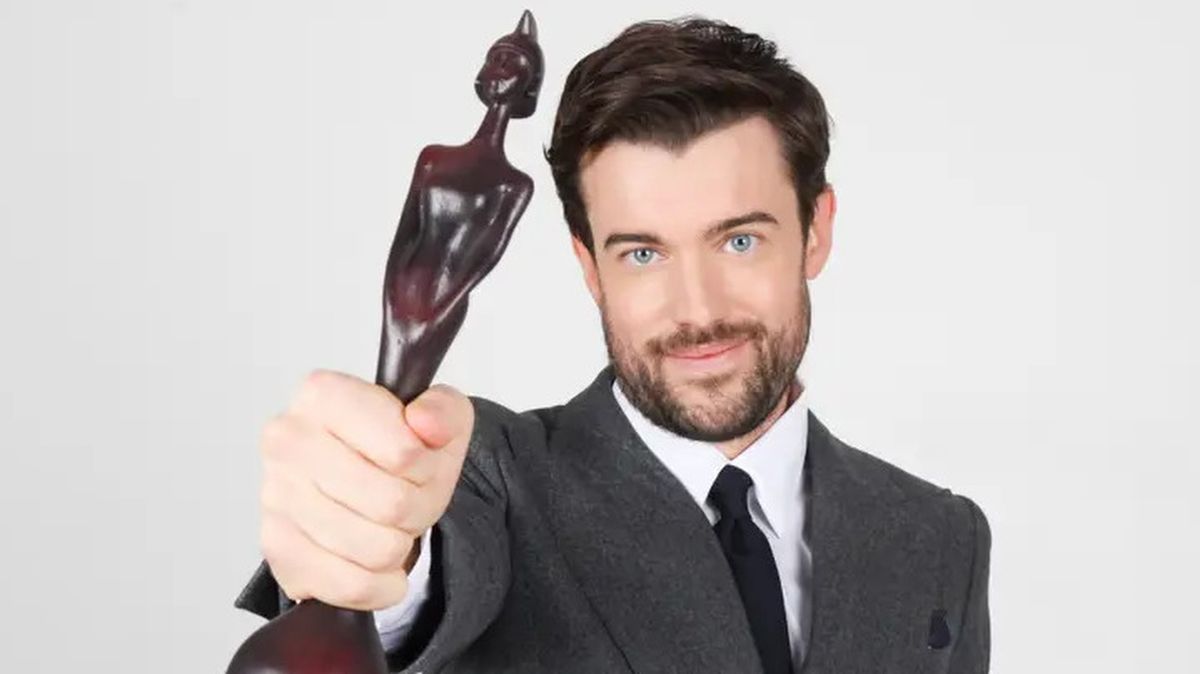 Host Jack Whitehall clutches an award in a promotional image for the BRITs 2025