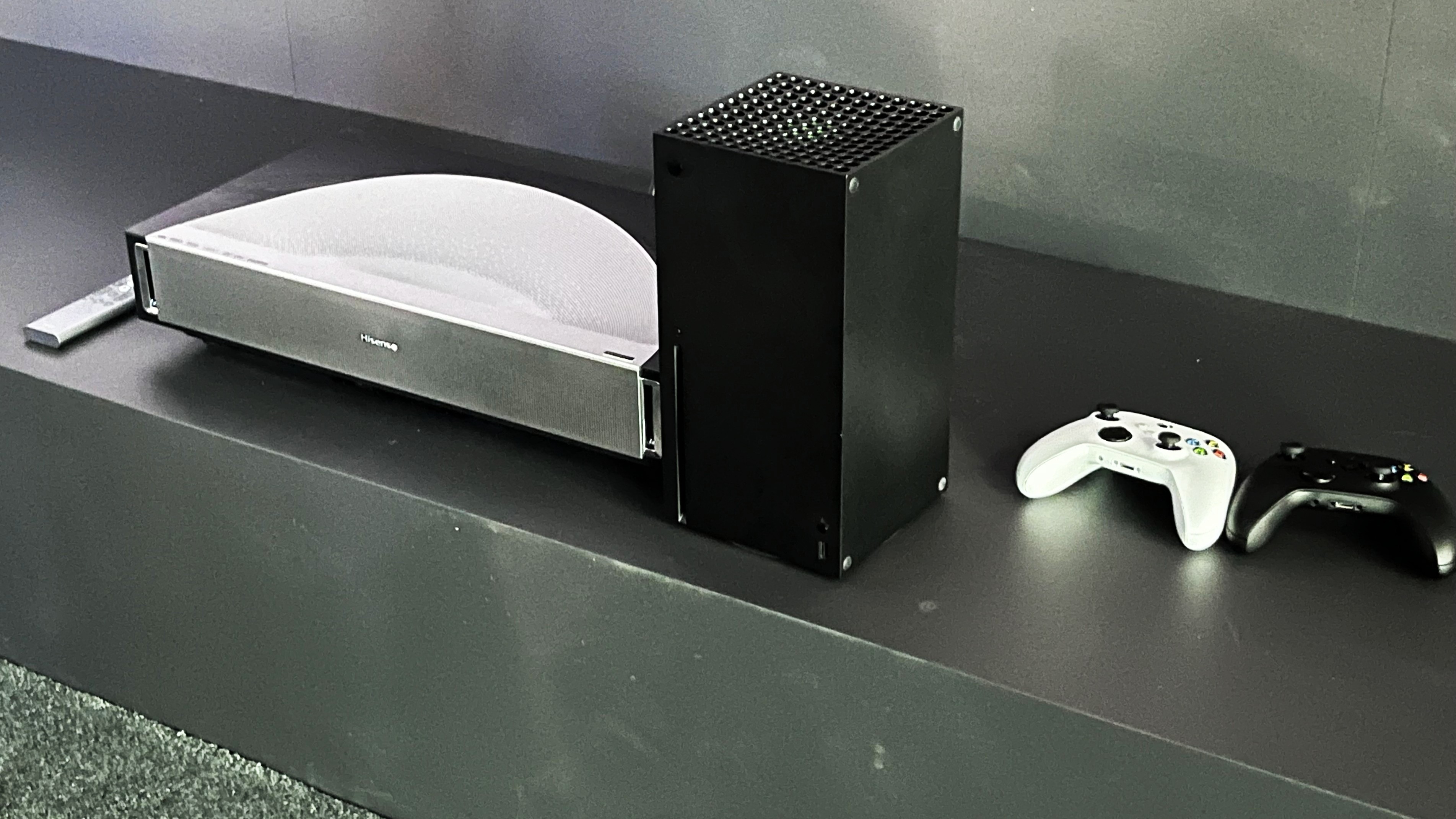 Hisense PX4-Pro with Xbox and game controllers