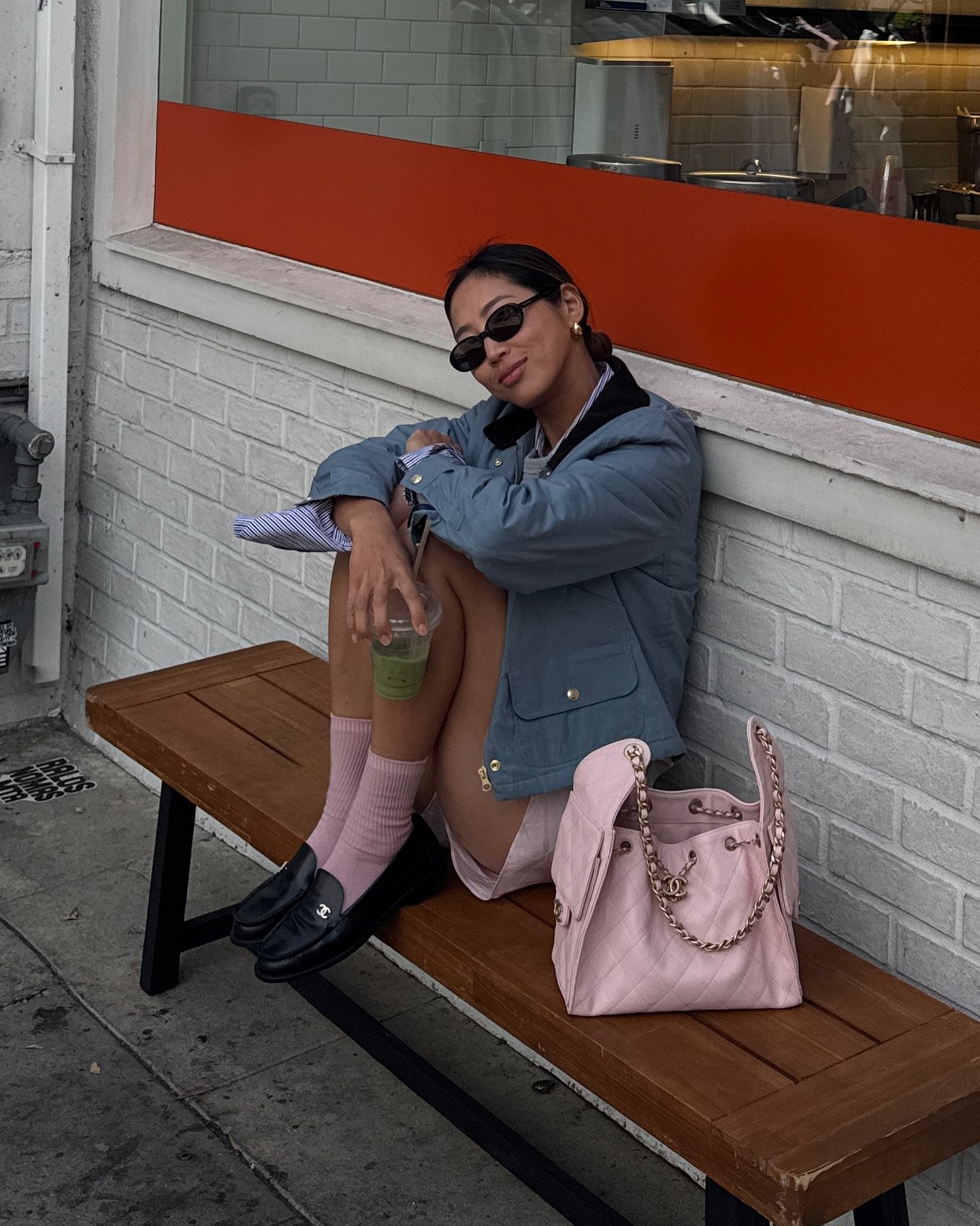 Woman wearing a blue barn jacket.