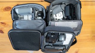 DJI Mini 3 Pro with Autel Lite and Bwine drones in their bags on a table