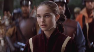 Padme wearing her maroon outfit and revealing her true identity in The Phantom Menace.