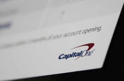 A piece of paper with the Capital One logo.
