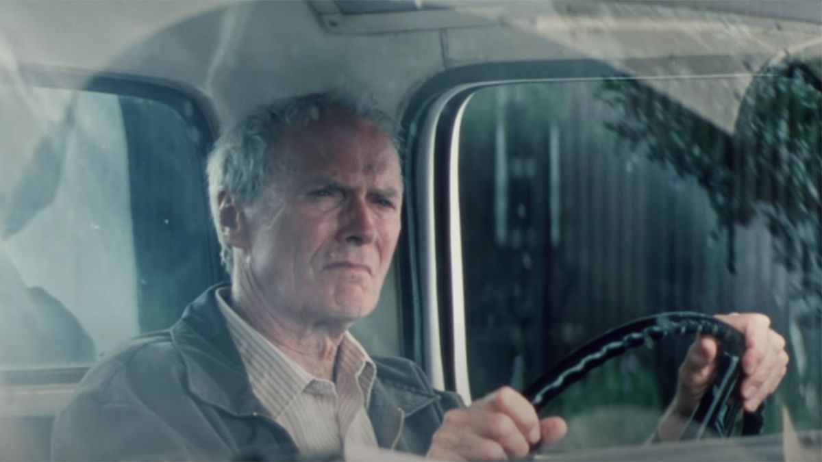 Clint Eastwood behind the steering wheel in Gran Torino. 