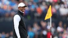 Tiger Woods smiling at the 2022 Open Championship