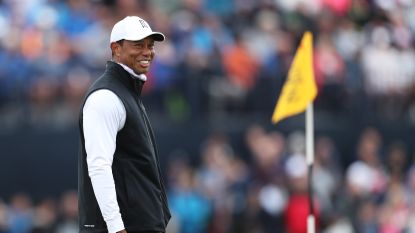 Tiger Woods smiling at the 2022 Open Championship