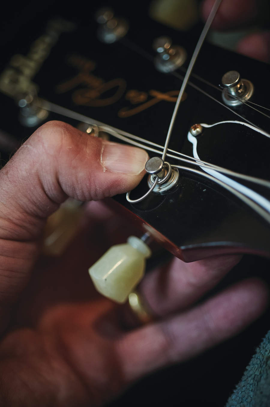 Restringing a guitar