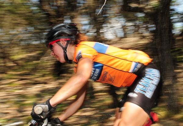 Alison Pennington (Team S&amp;M) streaks through the woods