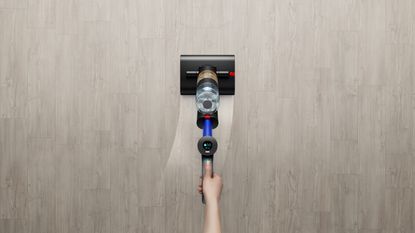 Dyson WashG1 wet floor cleaner cleaning a floor