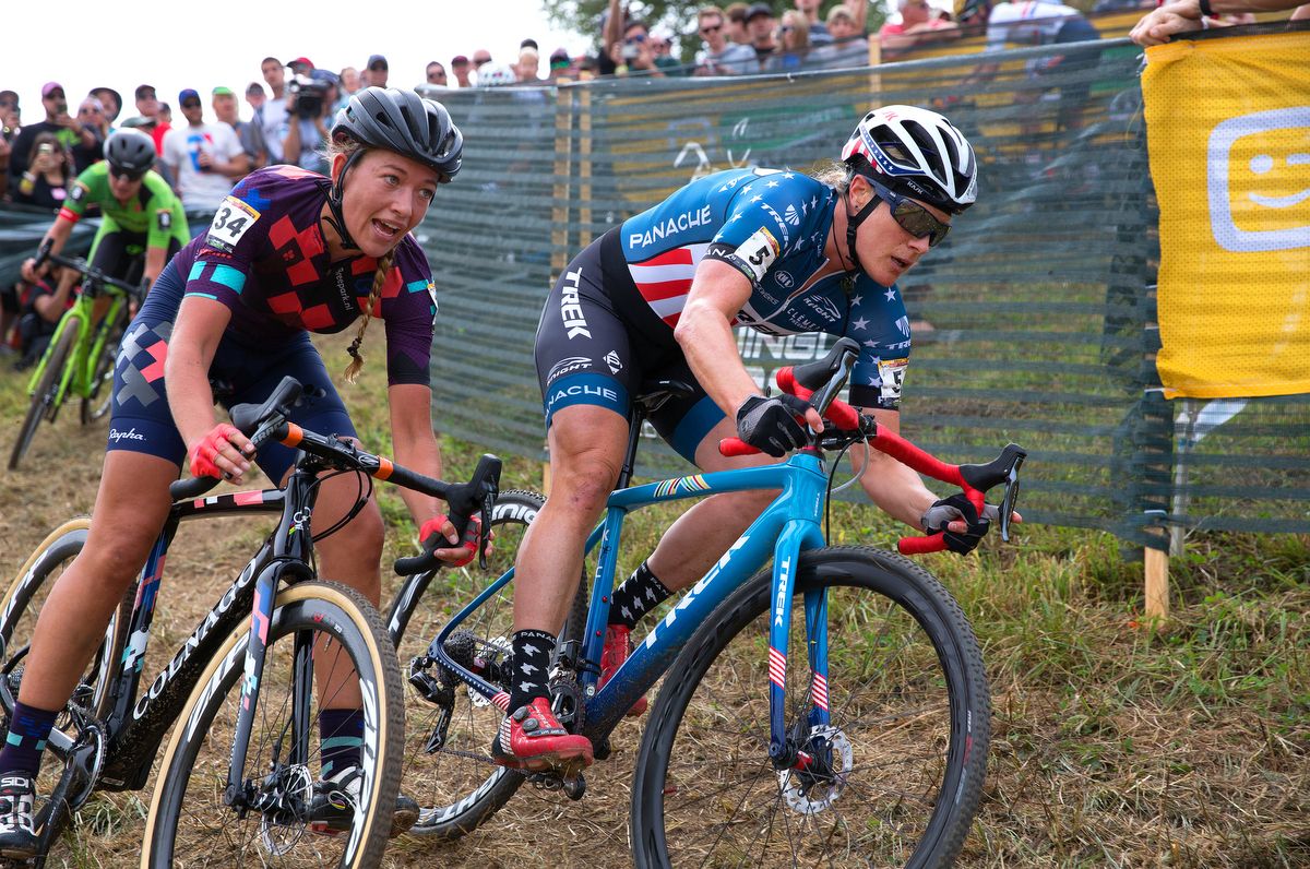 Katherine Compton holds off Sophie De Boer through the corner