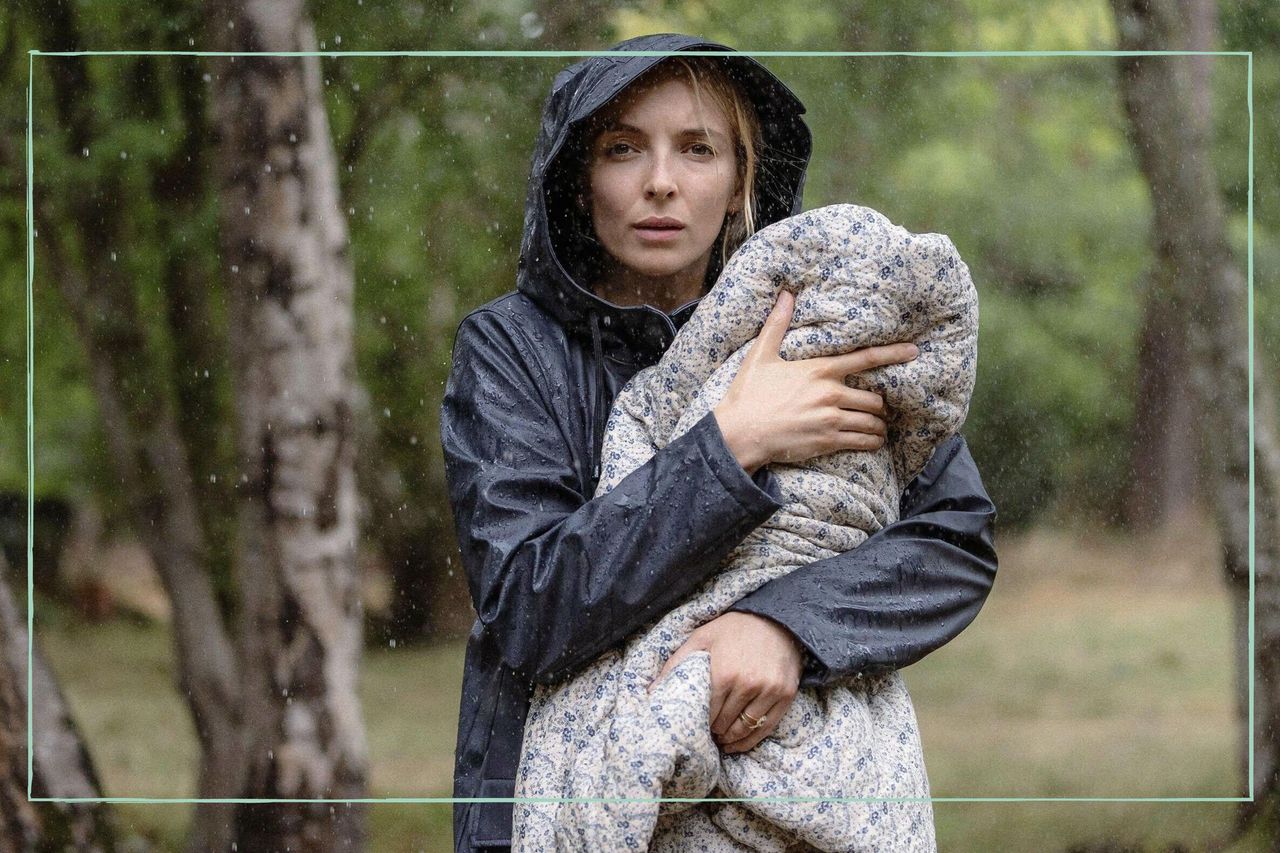 Jodie Comer holding a baby in The End We Start From