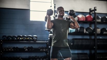 Man exercising with dumbbells