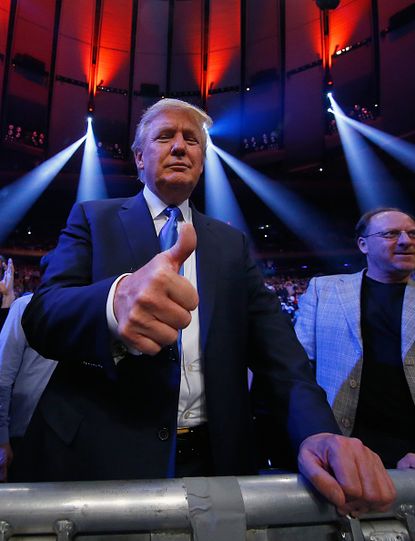 Trump attends a bout at Madison Square Garden in 2015, although these days he would rather be in one.