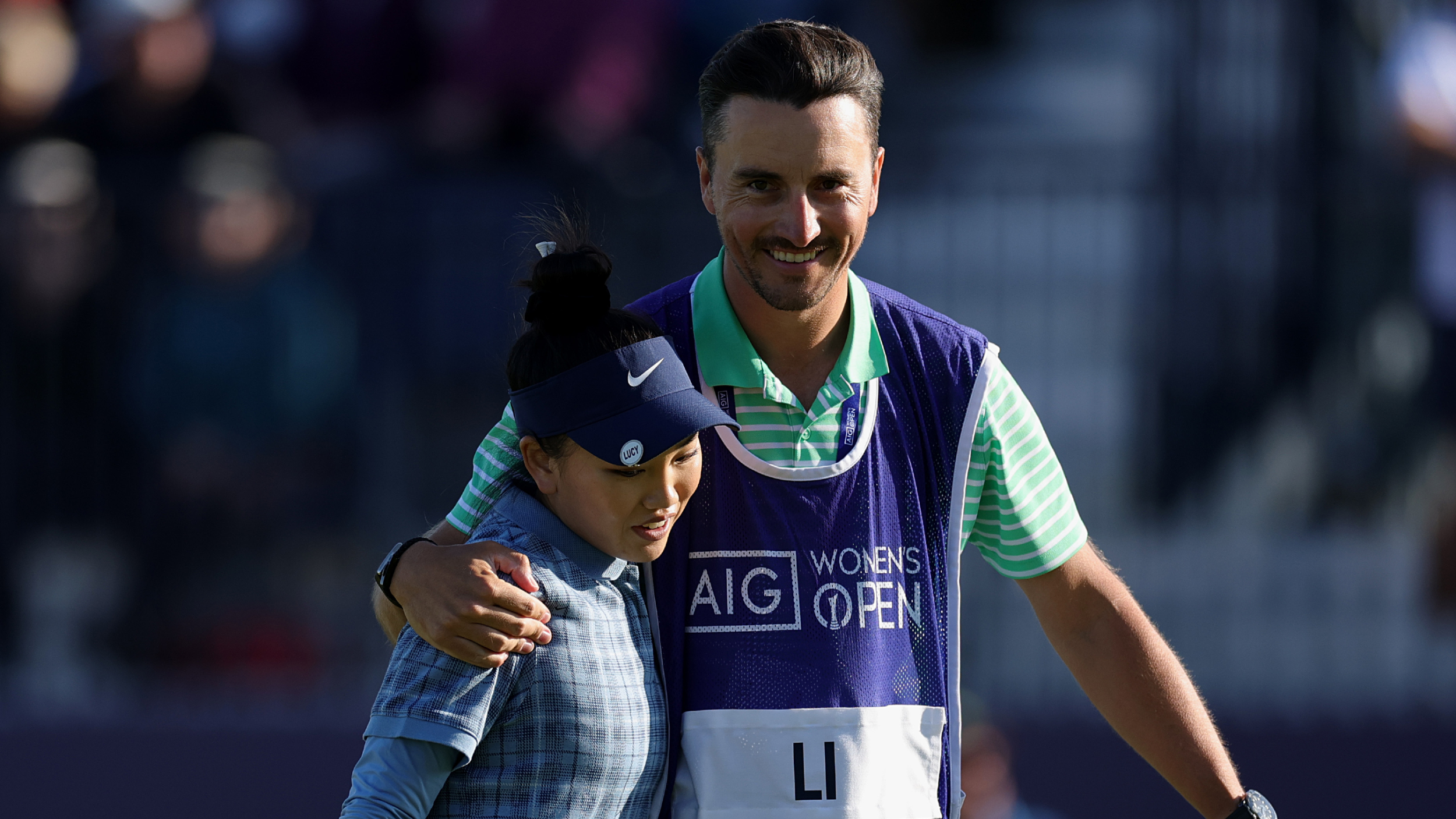 Lucy Li and her caddie at the AIG Women's Open