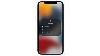 Apple iPhone on white background displaying Voice Isolation tech