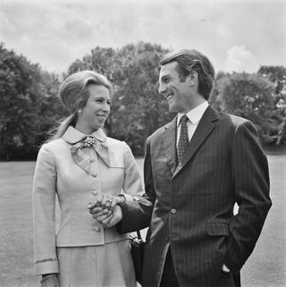 Anne, the Princess Royal, with her fiancé, equestrian champion Mark Phillips in the grounds of Buckingham Palace in London