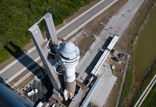 Boeing's Starliner OFT-2 spacecraft and its Atlas V rocket roll to the launch pad on May 18, 2022.