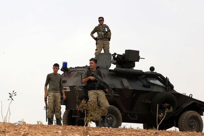 As Kurdish fighters hang on in Kobani, Turkey bombs Kurdish targets