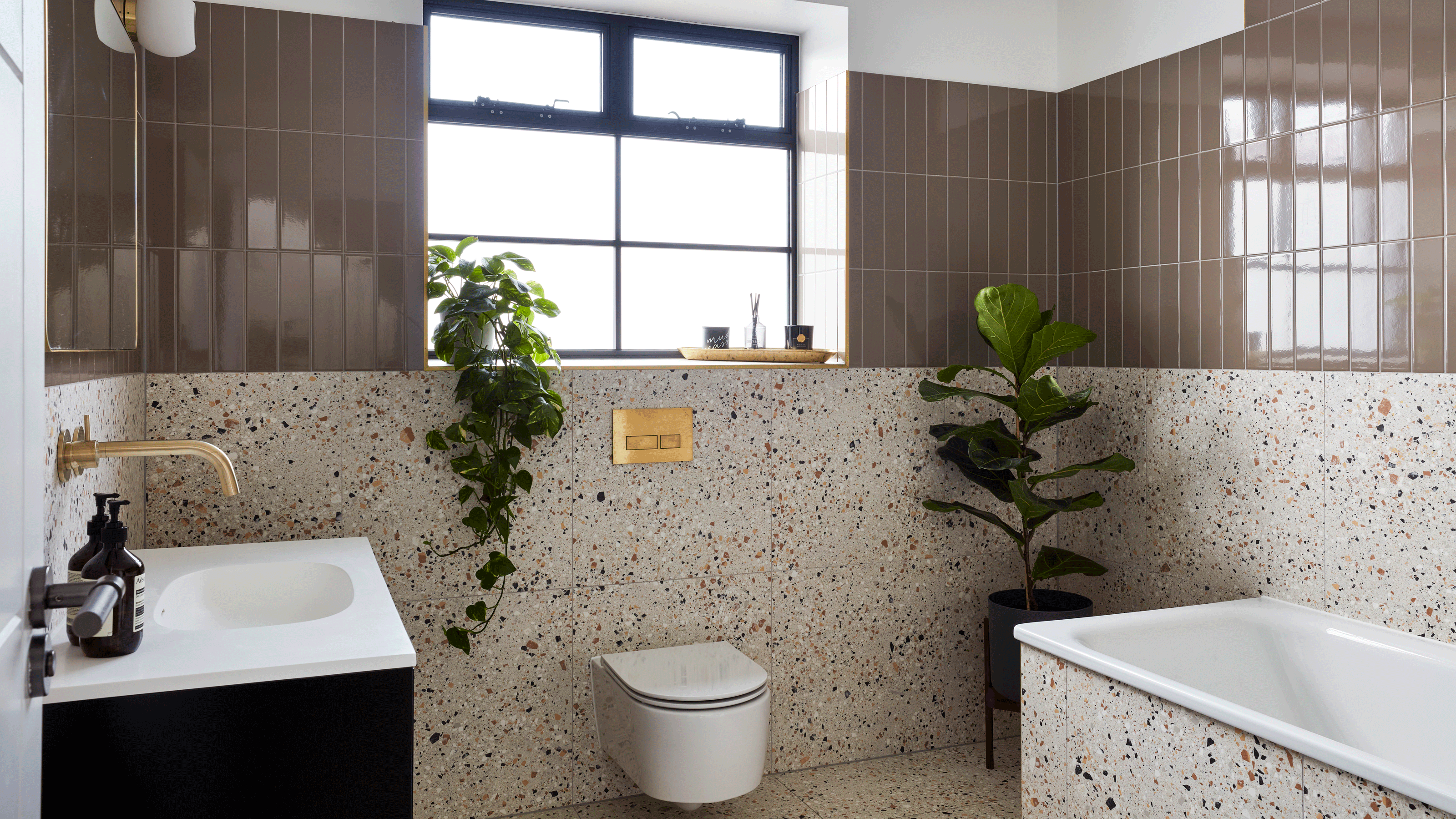 Blue bathroom with black toilet