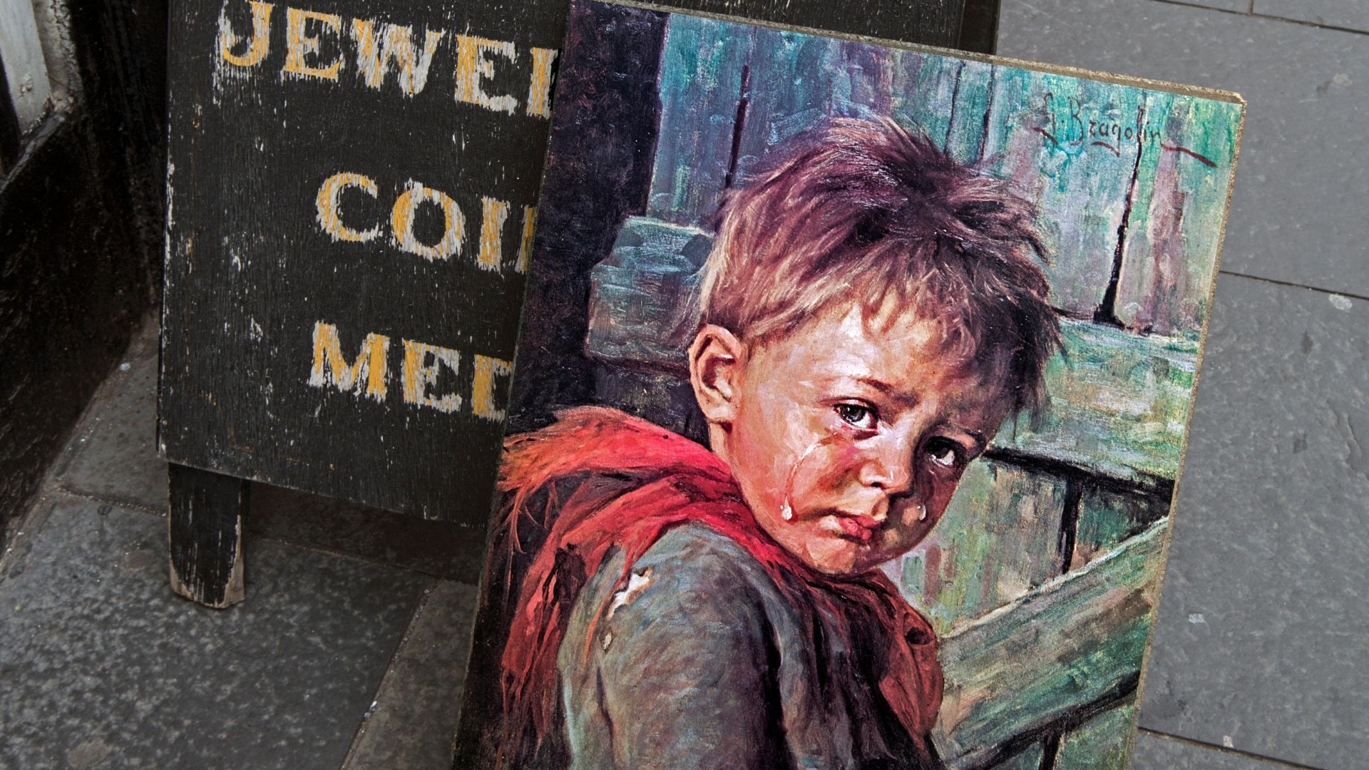 A painting of a Crying Boy in the style of Giovanni Bragolin