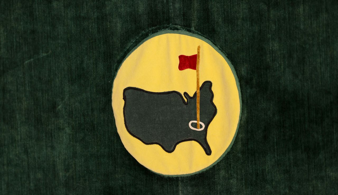 The logo of Augusta National on a yellow and green background