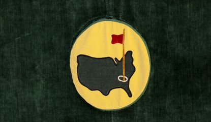 The logo of Augusta National on a yellow and green background