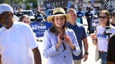 Dr. Amy Acton, the Democratic candidate for Governor of Ohio, greets constituents along the parade route of the 54th Annual CDC Parade in Cleveland