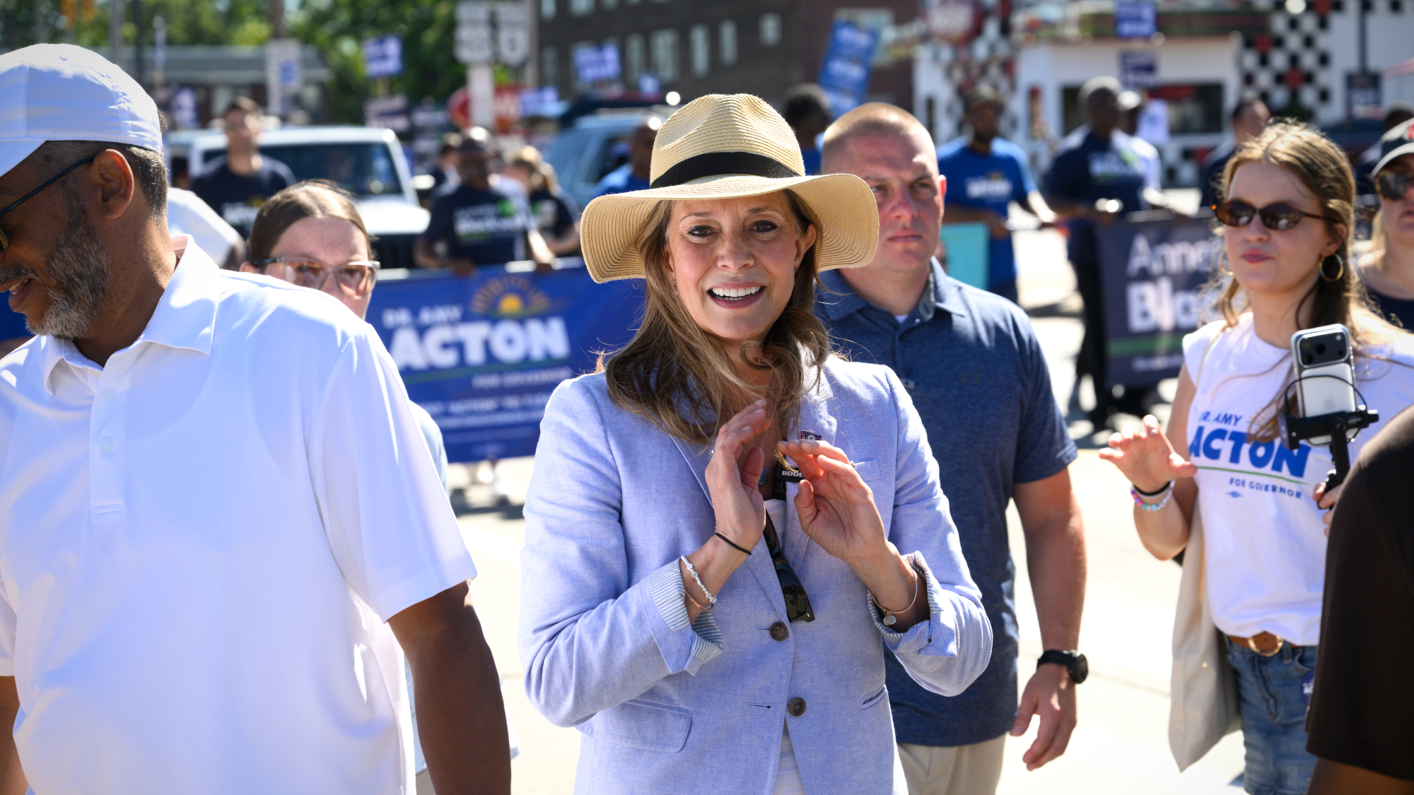 Dr. Amy Acton, the Democratic candidate for Governor of Ohio, greets constituents along the parade route of the 54th Annual CDC Parade in Cleveland