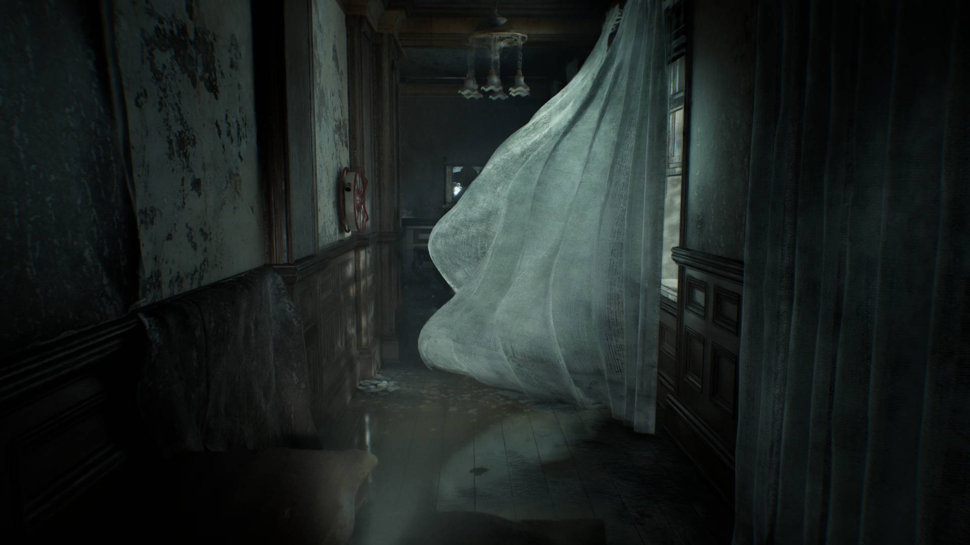 Resident Evil Requiem screenshot of sheer curtain blowing in a dark corridor.