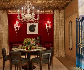 Red dining room by Joy Moyler at WOW!House Chelsea Harbour