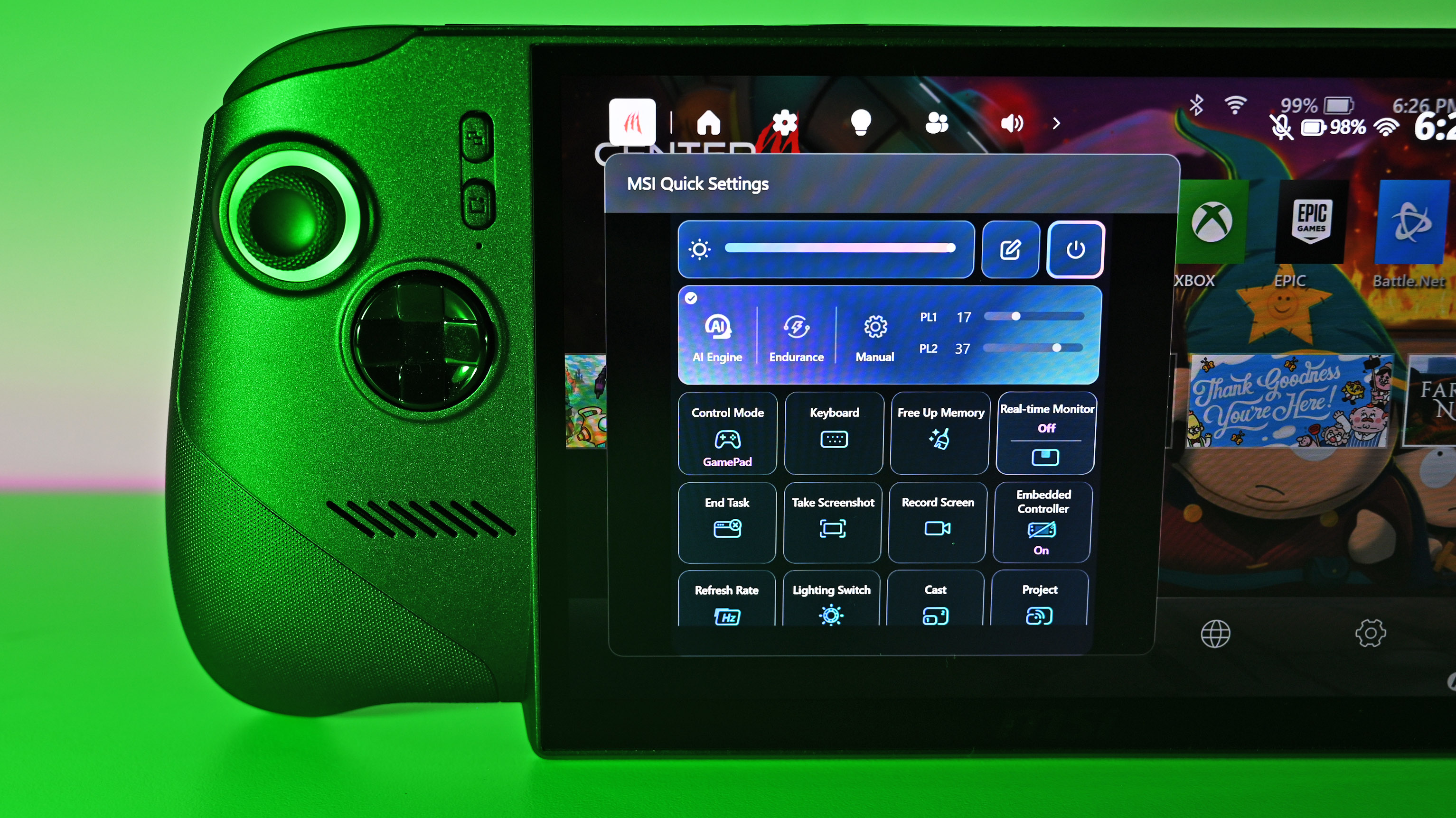 The handheld's display showing the MSI Quick Settings menu layered over the home screen under bright green lighting.