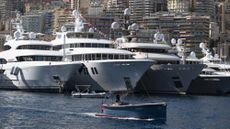 Superyachts are seen docked in the port of Monaco on Sept. 27, 2023.