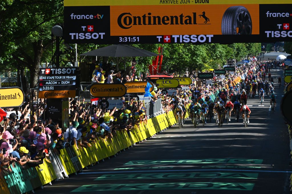 DIJON FRANCE JULY 04 A general view of Jasper Philipsen of Belgium and Team Alpecin Deceuninck Wout Van Aert of Belgium and Team Visma Lease a Bike Fernando Gaviria of Colombia and Movistar Team Biniam Girmay of Eritrea and Team Intermarche Wanty Green Sprint Jersey Phil Bauhaus of Germany and Team Bahrain Victorious and Dylan Groenewegen of Netherlands and Team Jayco AlUla sprint at finish line to win the 111th Tour de France 2024 Stage 6 a 1635km stage from Macon to Dijon UCIWT on July 04 2024 in Dijon France Photo by Dario BelingheriGetty Images