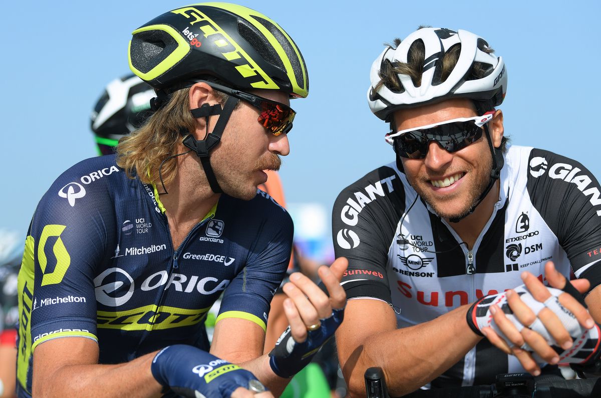 Former teammates Mitch Docker and Bert de Backer chat on the start line