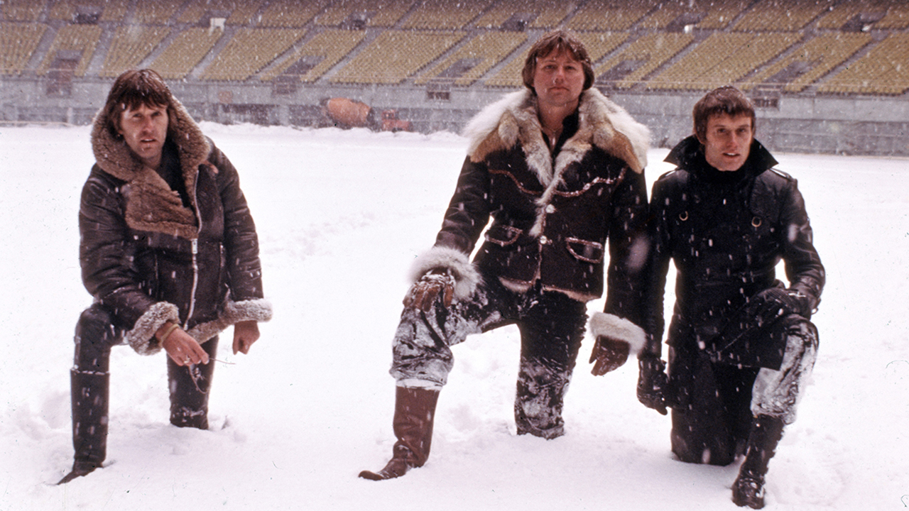English progressive rock group Emerson Lake and Palmer during rehearsals for the band's 'Works' tour, at the Olympic Stadium, Montreal, Canada, February 1977. Left to right: keyboard player Keith Emerson, guitarist Greg Lake and drummer Carl Palmer. (Photo by Michael Putland/Getty Images)
