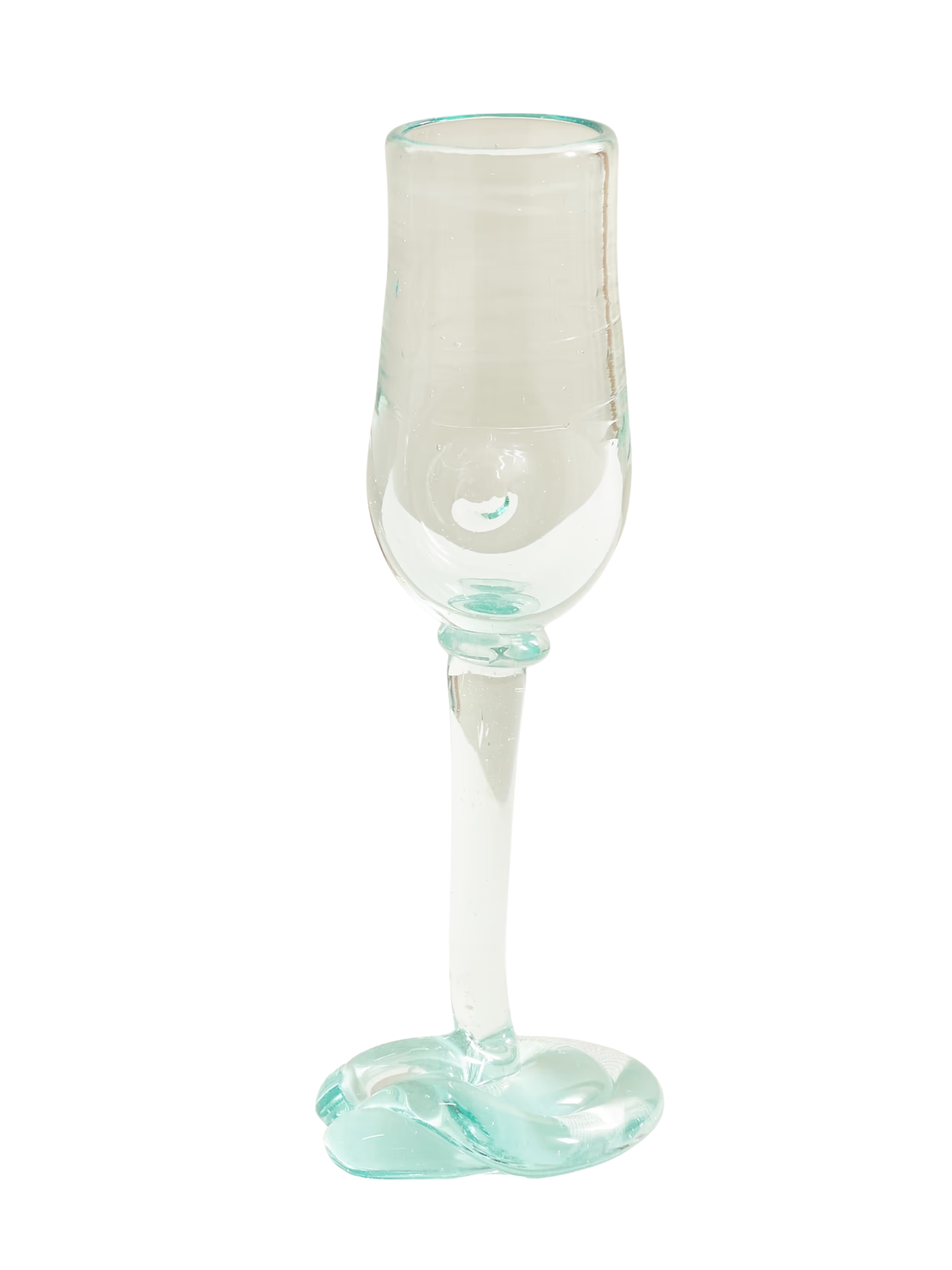 A transparent, organically shaped champagne flute.