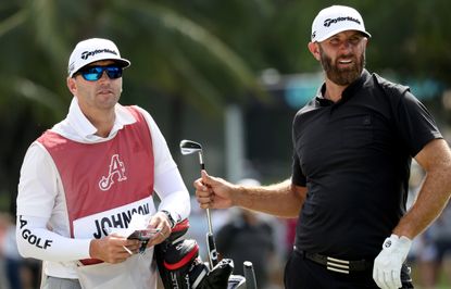 Dustin Johnson's caddie Austin