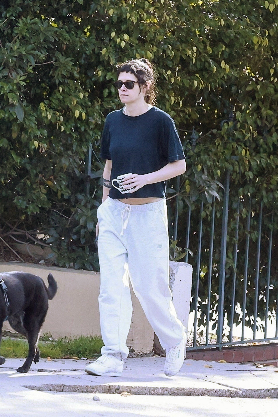 Kristen Stewart went for a walk with her dog in sweatpants and stark white Reebok sneakers