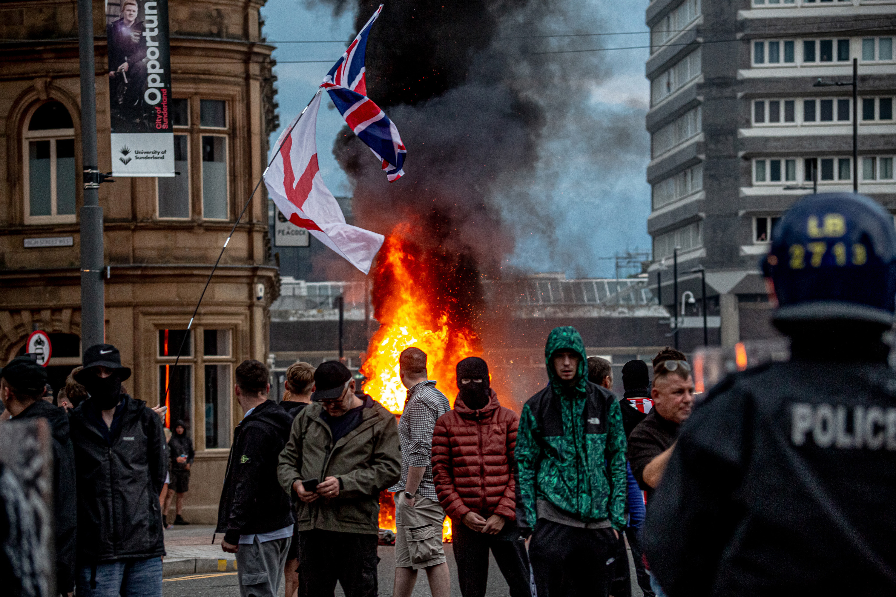 Far-right activists hold an 'Enough is Enough' protest on August 02, 2024 in Sunderland, England. After the murders of three girls in Southport earlier this week, misinformation spread via social media and fueled acts of violent rioting from far-right actors across England. While they prefer to be called 'concerned parents', their actions point to racial hatred with a particular focus on Islamophobia thus targeting mosques.