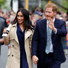 melbourne, australia october 18 prince harry, duke of sussex and meghan, duchess of sussex wave to the crowd as they arrive at the royal botanic gardens on october 18, 2018 in melbourne, australia the duke and duchess of sussex are on their official 16 day autumn tour visiting cities in australia, fiji, tonga and new zealand photo by phil noble poolgetty images