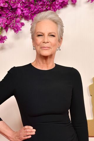 Jamie Lee Curtis is pictured with her silver hair styled into a short, voluminous pixie-style cut at the 96th Annual Academy Awards on March 10, 2024 in Hollywood, California.