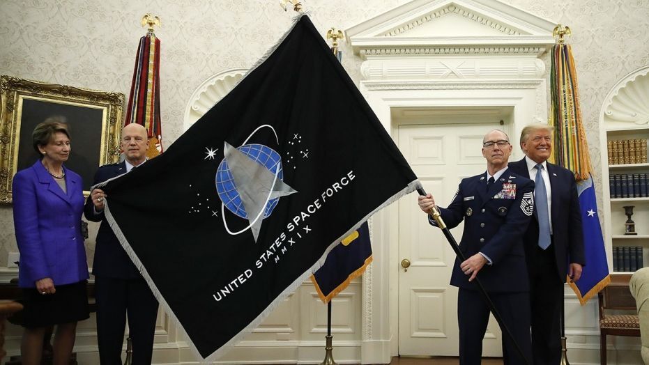 The official flag of the U.S. Space Force is unveiled at the White House event with President Donald Trump on May 15, 2020.