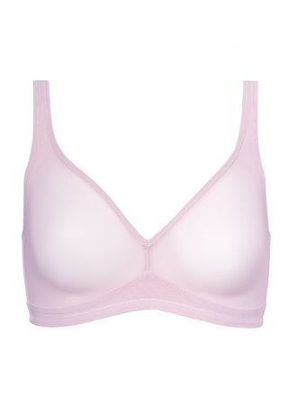 A sheer Cuup bra in front of a plain backdrop in a guide to a katie holmes outfit